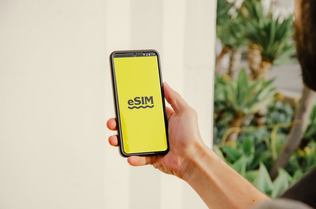 Phone showing eSIM setup for an eSIM vs physical SIM comparison in modern phone plans.
