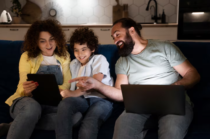 Streaming account sharing shown with a family using multiple devices together at home.